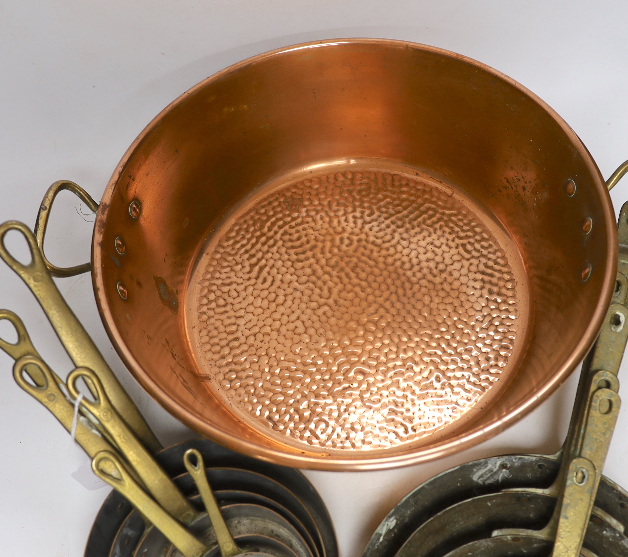 A set of 6 graduated saucepans and a similar and a 2 handled preserve pan, 45cm